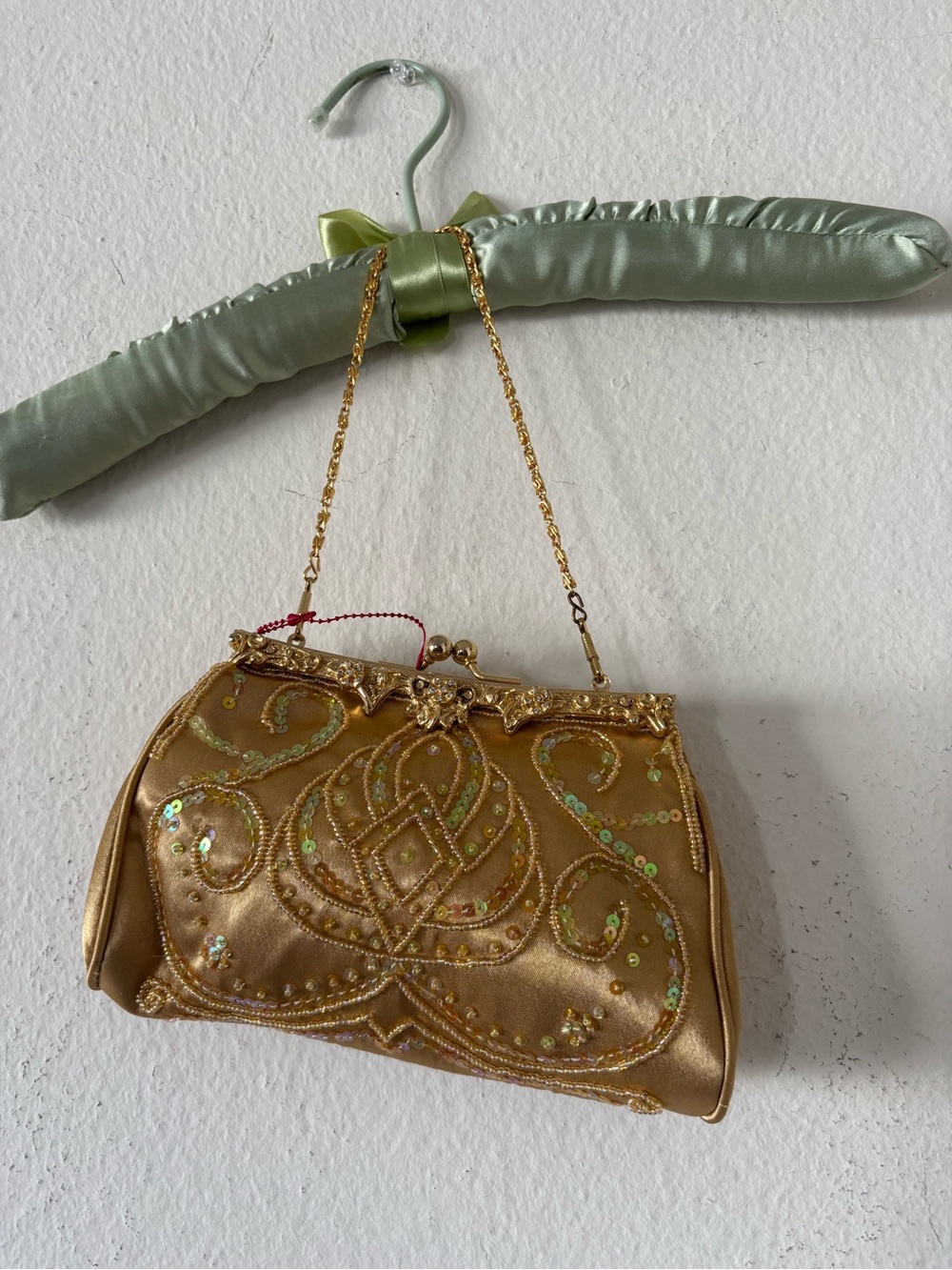 Vintage Gold beaded clucth handbag has a shot shoulder strap brand new with tags